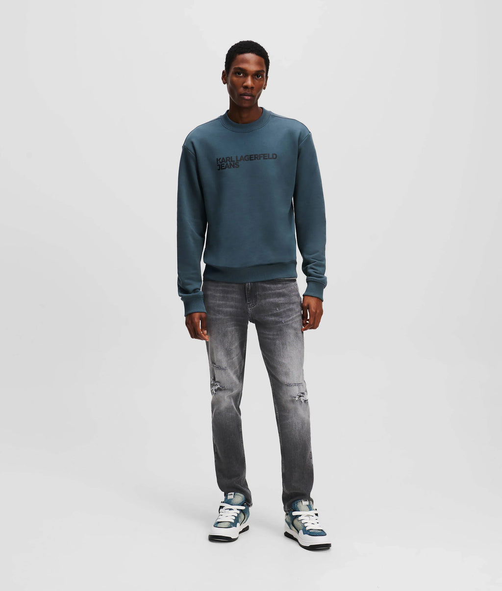 DISTRESSED SLIM JEANS